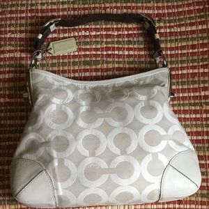 Coach Peyton optic art medium leather/canvas shoulder bag light taupe color.